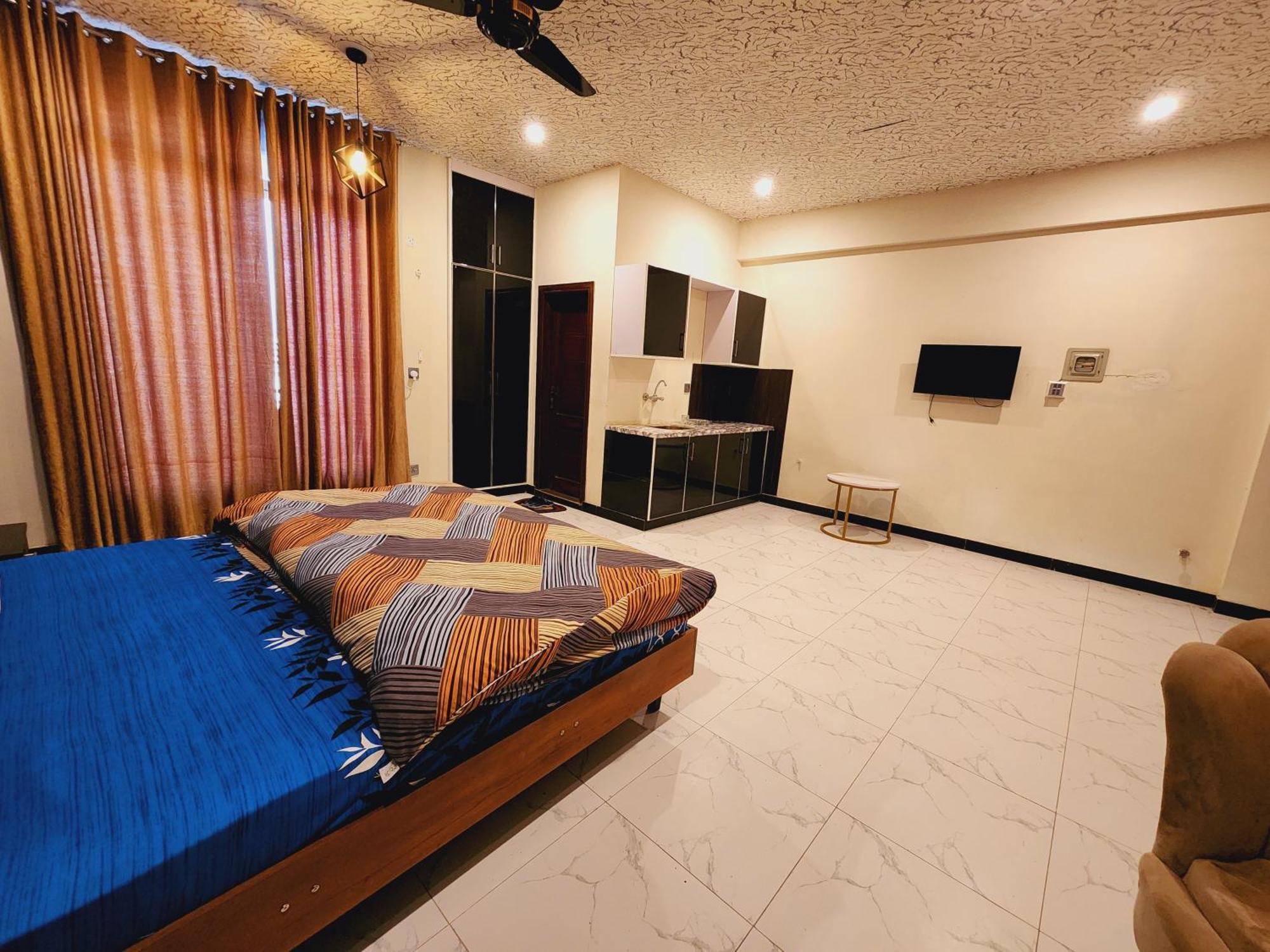 Motorway Majesty Suites Islamabad - Near Islamabad International Airport And Motorway Номер фото