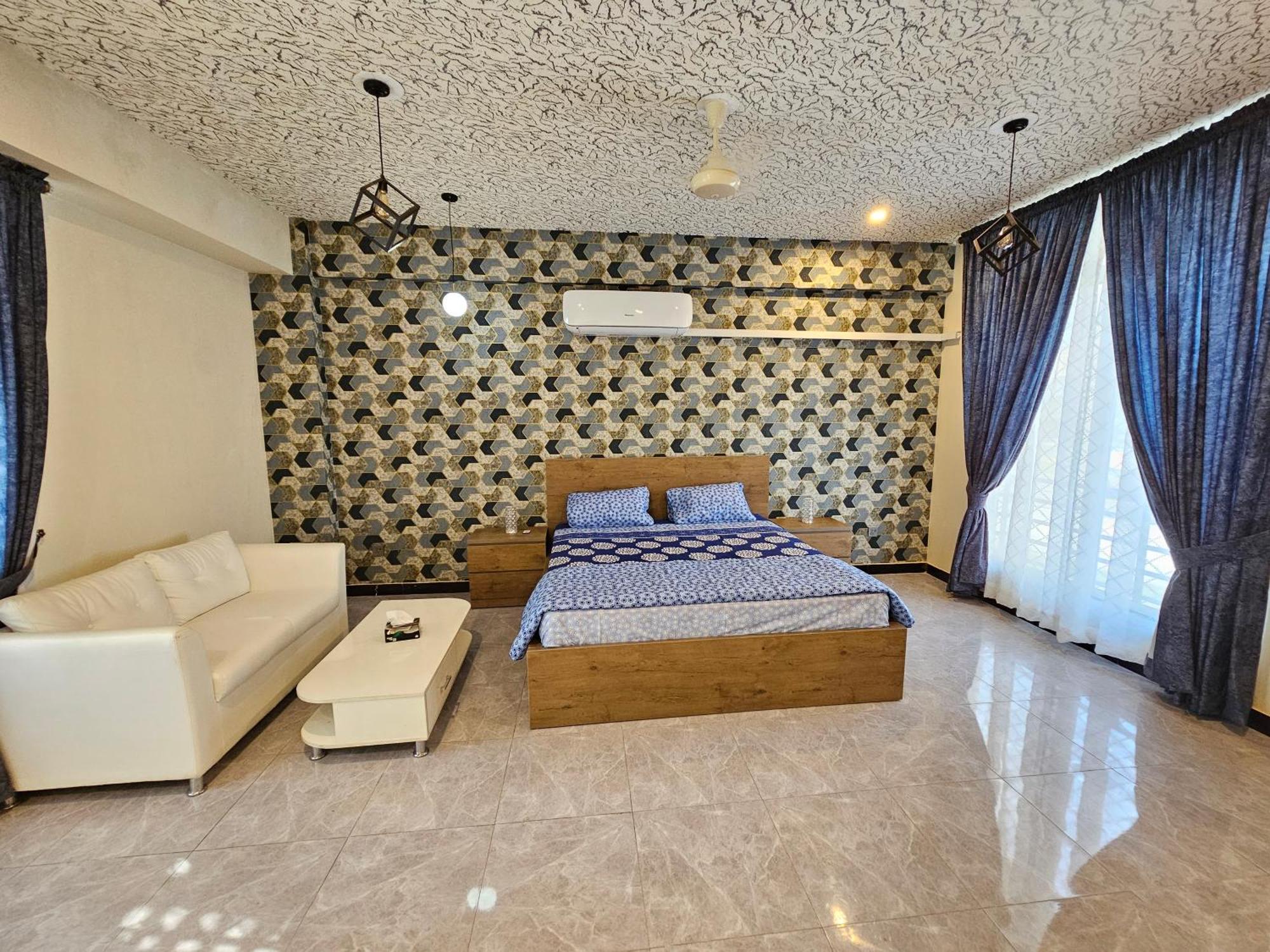 Motorway Majesty Suites Islamabad - Near Islamabad International Airport And Motorway Номер фото